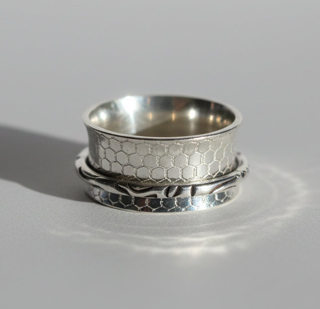 Buddhist-inspired handcrafted sterling silver meditation / fidget ring