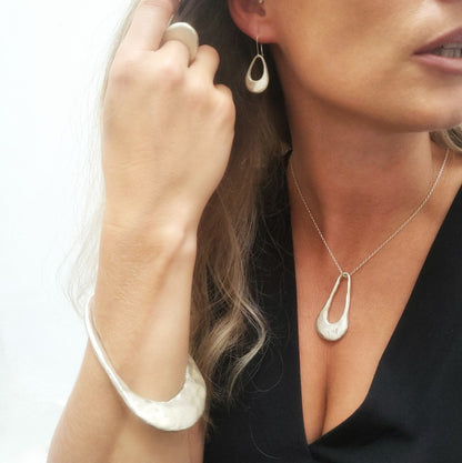 Pearlescent textured sterling silver handcrafted earrings