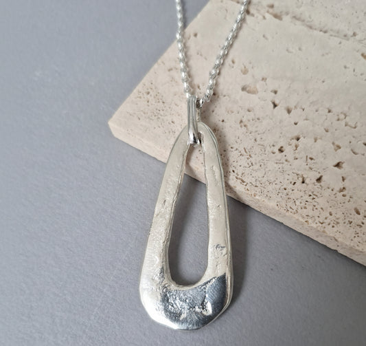Handcrafted pearlescent pendant in sterling silver