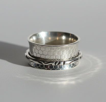 Buddhist-inspired handcrafted sterling silver meditation / fidget ring