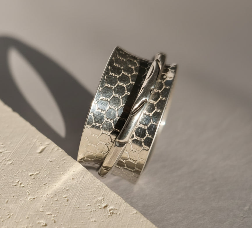 Buddhist-inspired handcrafted sterling silver meditation / fidget ring