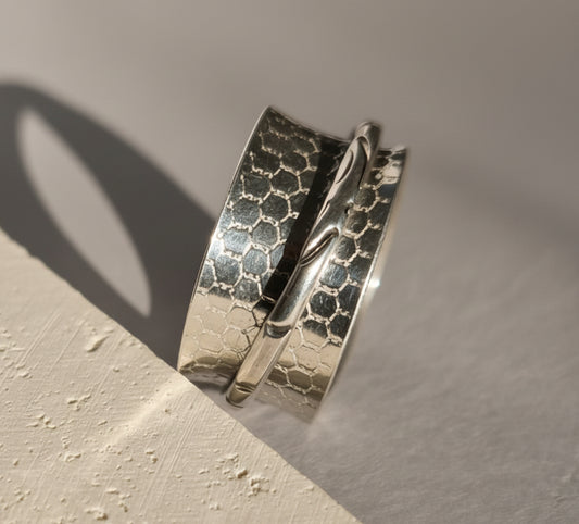 Buddhist-inspired handcrafted sterling silver meditation / fidget ring